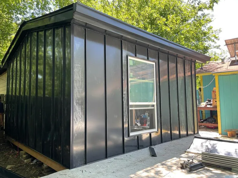 Black standing seam metal wall panels for Roof Inspection in Clawson