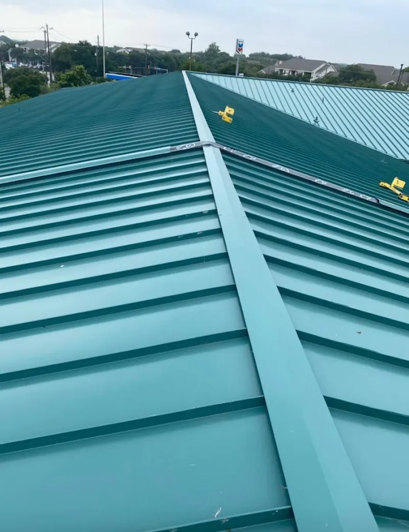 Green commercial metal roof ridge and valley for Metal Roof Repair in Clawson